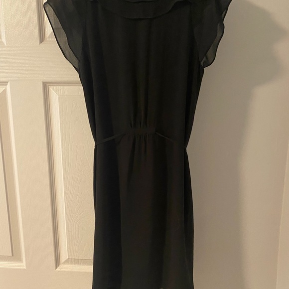 H&M short black dress with string tie waist and ruffle top. - Picture 3 of 4